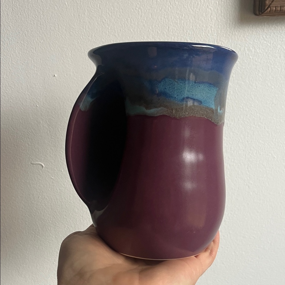 Neher 2018 clay in motion Blue and Purple hand warming mug left handed